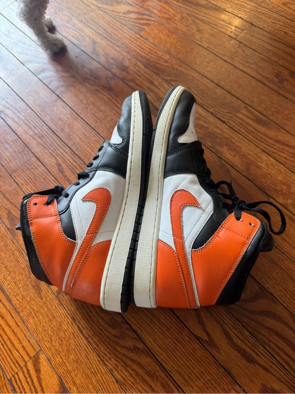 Black White and Orange High-Top Jordan 1